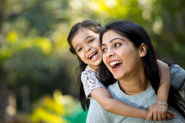 Mother and child smiling